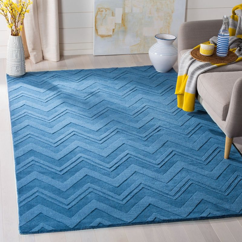 Impressions IM398 Hand Loomed Area Rug - Blue - 7'6"x9'6" - Safavieh.