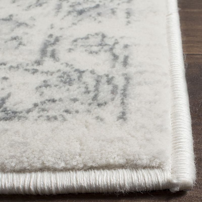 Carnegie CNG621 Power Loomed Area Rug - Cream/Grey - 6'7"x9'2" - Safavieh.