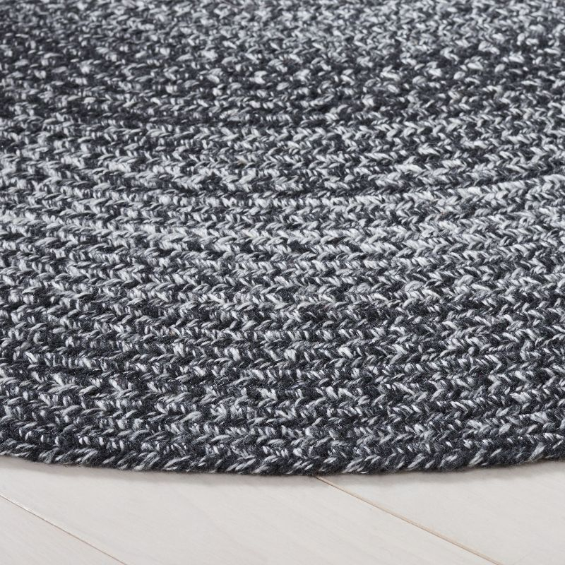 Braided BRD804 Hand Woven Area Rug - Black/Ivory - 4' round - Safavieh.