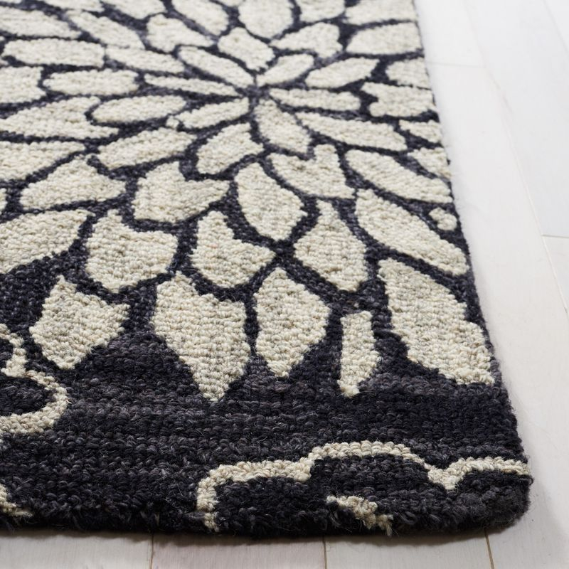 Jardin JAR602 Hand Tufted Area Rug - Black/Ivory - 8'x10' - Safavieh.