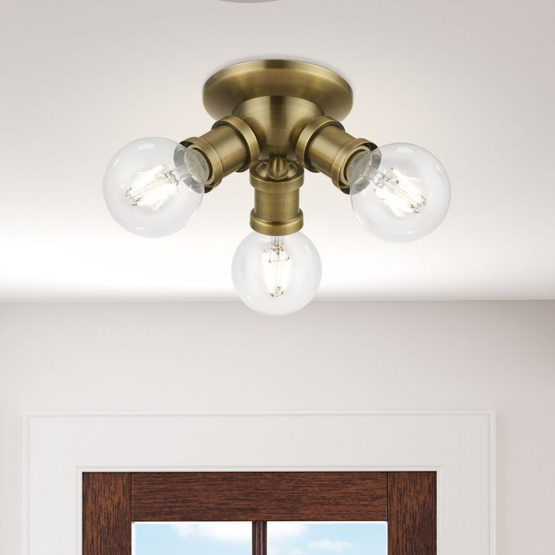 Livex Lighting Lansdale 3 - Light Flush Mount in  Antique Brass