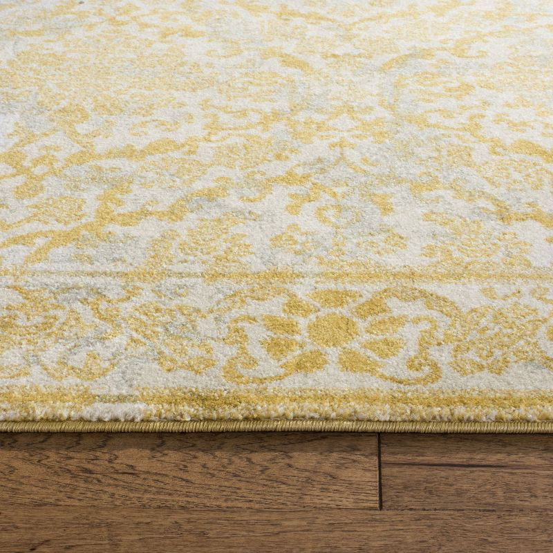 Evoke EVK242 Power Loomed Area Rug - Ivory/Gold - 6'7"x9' - Safavieh.