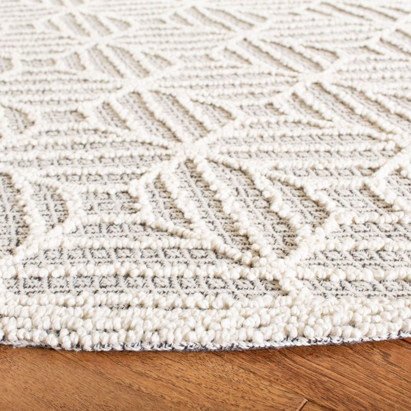 Trace TRC212 Hand Tufted Area Rug - Ivory/Black - 6' Round - Safavieh.