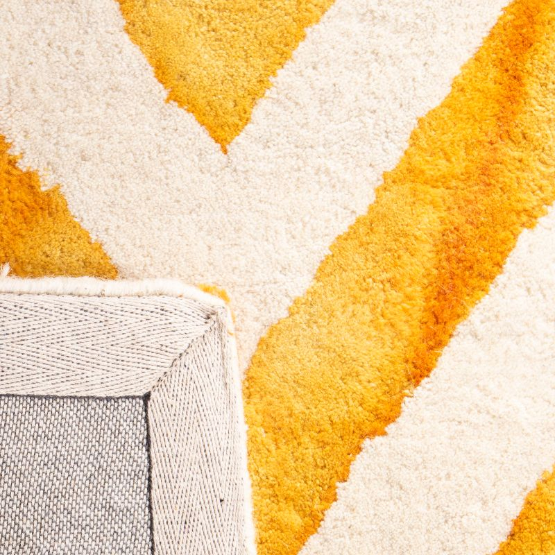 Dip Dye DDY715 Hand Tufted Area Rug - Ivory/Gold - 3'x5' - Safavieh.