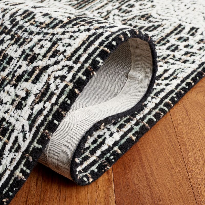 Ebony EBN114 Hand Tufted Area Rug - Black/Ivory - 6'x6' - Safavieh.