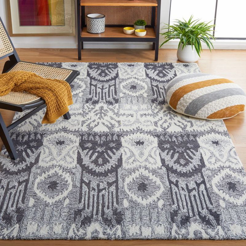 Ikat IKT653 Hand Tufted Area Rug - Ivory/Black - 5'x8' - Safavieh.