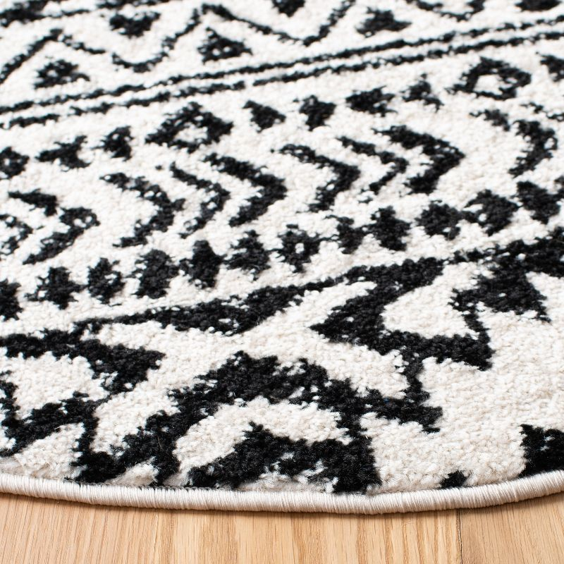 Tulum TUL272 Power Loomed Area Rug - Ivory/Black - 3' round - Safavieh.