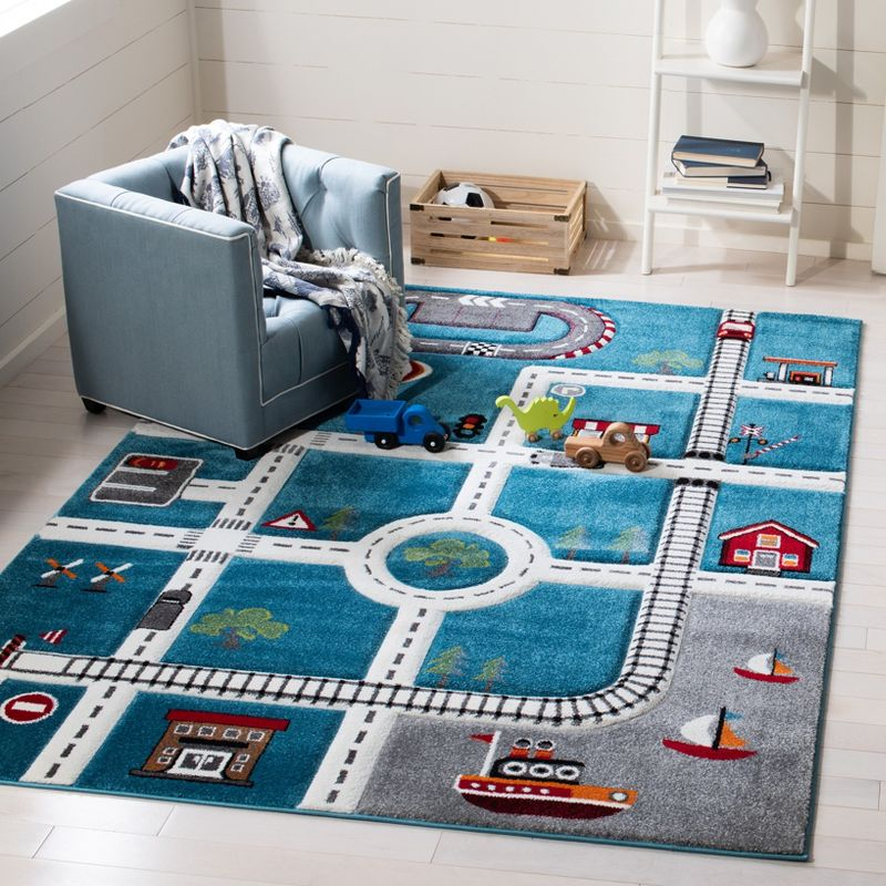 Carousel Kids  CRK192 Loomed Indoor Area Rug - Turquoise/Ivory - 5'3"x7'6" - Safavieh
