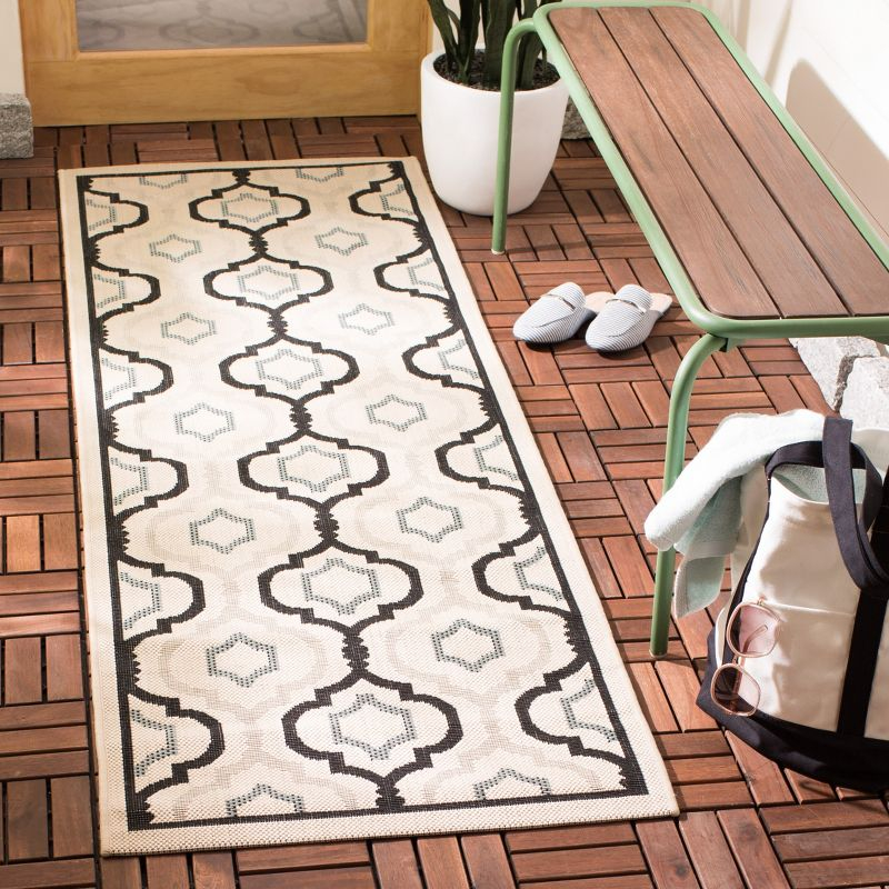 Courtyard Brookstone CY7938 UV & Stain Resistant Non-Shedding Power Loomed Indoor/Outdoor Runner Rug - Ivory/Black - 2'3"x12' - Safavieh