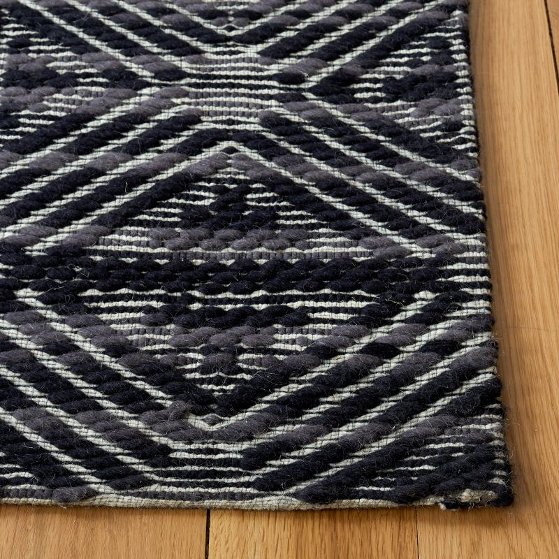 Marbella MRB451 Hand Loomed Area Rug - Black/Ivory - 6'x9' - Safavieh.