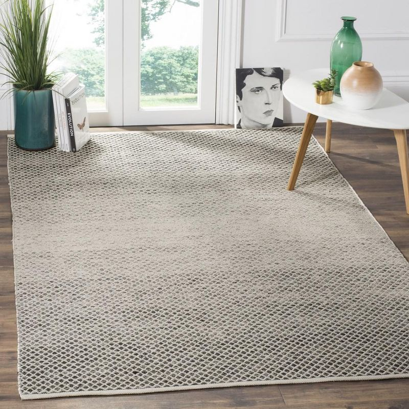 Montauk MTK601 Hand Woven Indoor Area Rug - Black/Ivory - 6'x9' - Safavieh.
