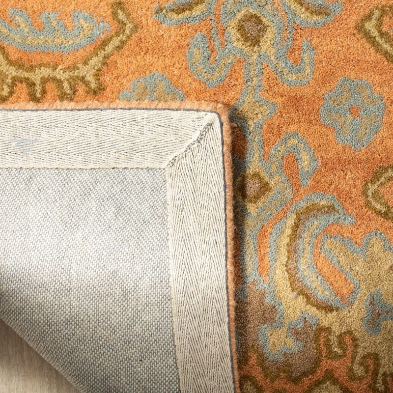 Wyndham WYD203 Hand Tufted Area Rug - Terracotta - 7'x7' - Safavieh.