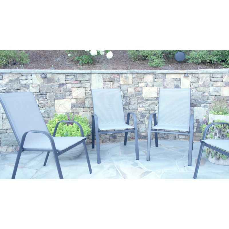Emma and Oliver 4 Pack Gray Outdoor Stack Chair with Flex Comfort Material - Patio Stack Chair