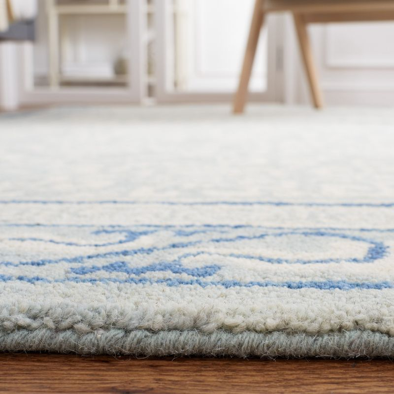 Antiquity AT860 Hand Tufted Indoor Area Rug - Light Blue/Ivory - 5'x8' - Safavieh