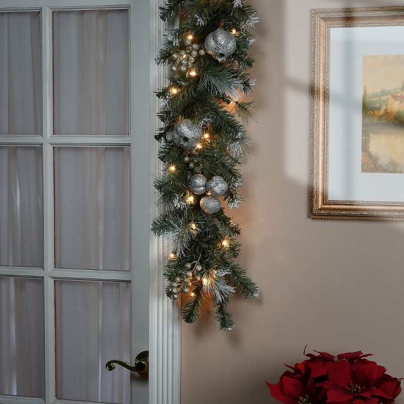 National Tree Company 9 ft. Glittery Pomegranate Pine Garland with Clear Lights