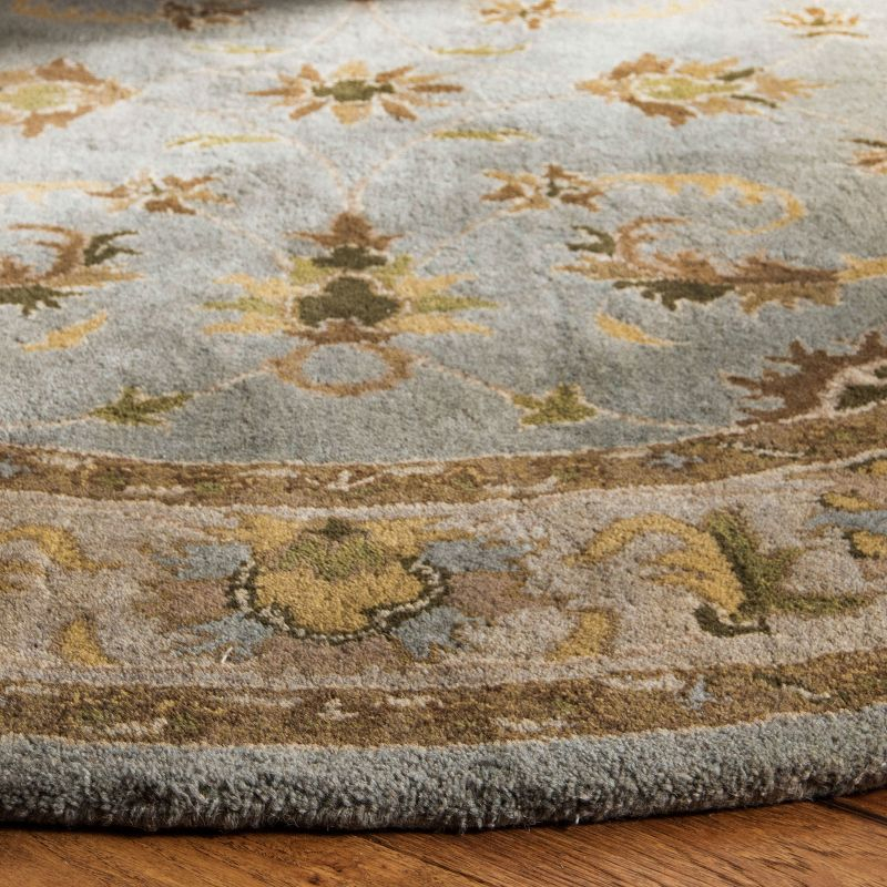 Heritage HG913 Hand Tufted Area Rug - Light Blue/Beige - 4'6"x6'6" Oval - Safavieh.