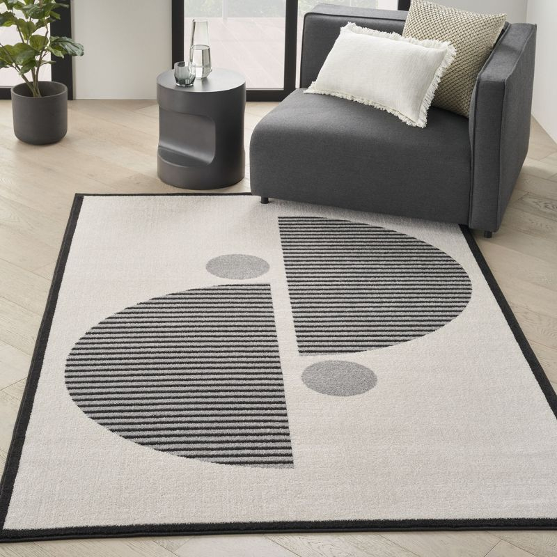 Nourison Modern Passion Circle Mid-Century Modern Indoor Rug Ivory/Black 6' x 9'