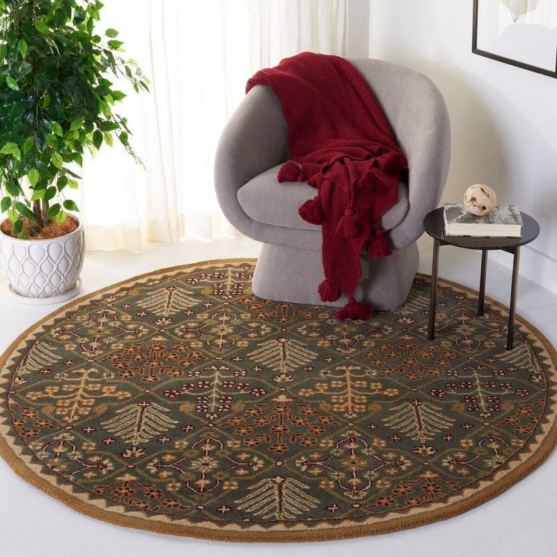 Antiquity AT613 Hand Tufted Area Rug - Light Blue/Gold - 8' round - Safavieh.