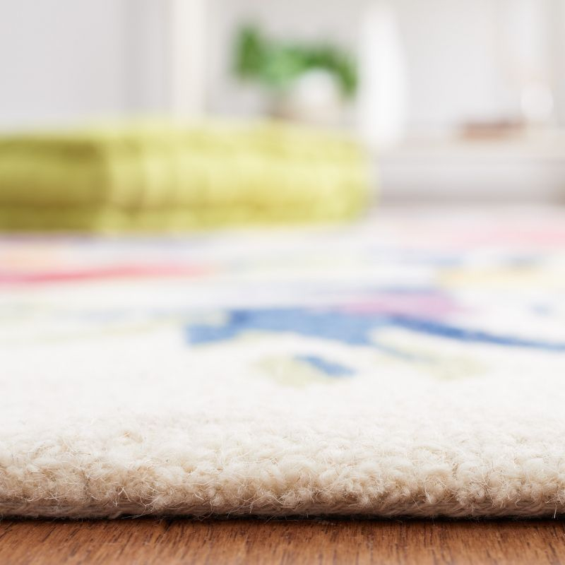 Chelsea HK219 Hand Tufted Area Rug - Ivory/Rose - 6'x9' - Safavieh.
