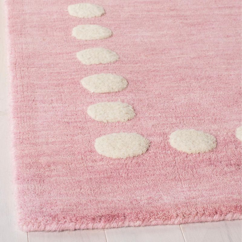 Safavieh Kids SFK802 Hand Loomed Indoor Area Rug - Pink - 5'x8' - Safavieh