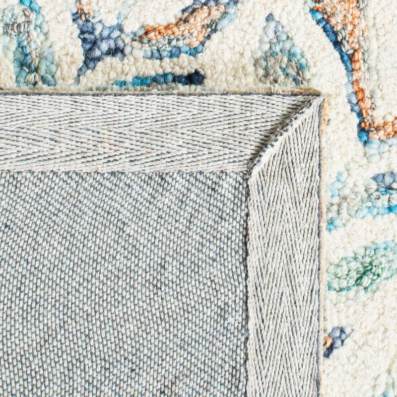 Capri CPR208 Tufted Indoor Area Rug - Ivory/Blue - 9'x12' - Safavieh