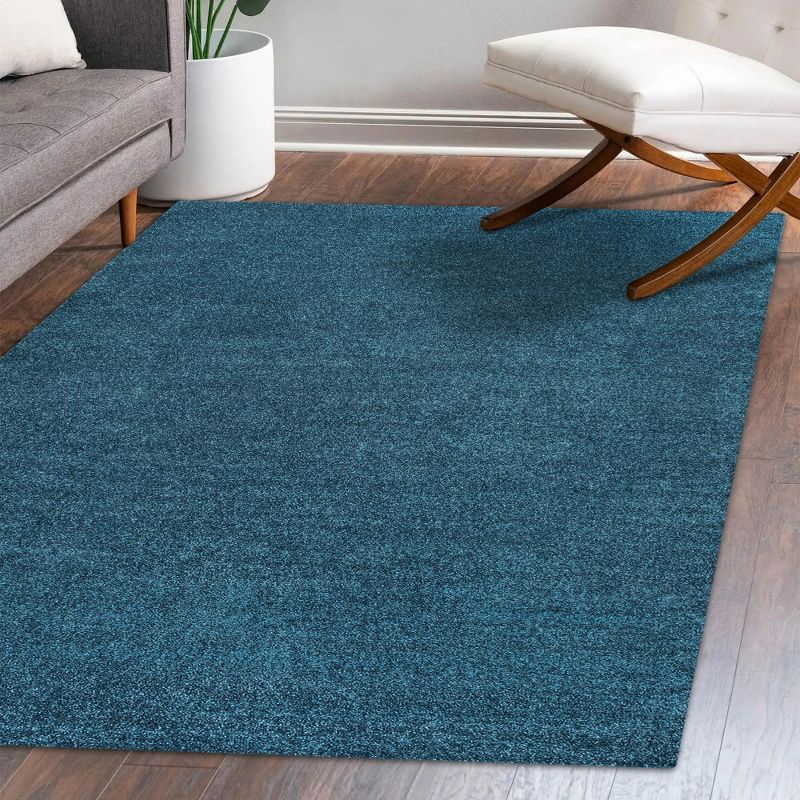 8'x10' Haze Solid Low-Pile Area Rug, Turquoise - JONATHAN Y