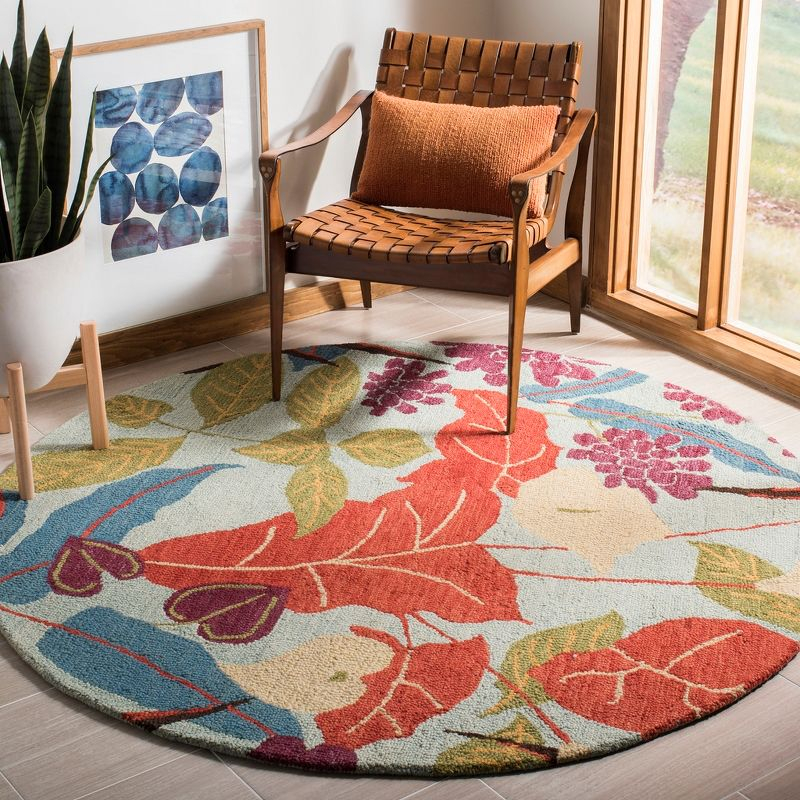 Blossom BLM674 Hand Hooked Area Rug - Blue/Multi - 4' round - Safavieh.
