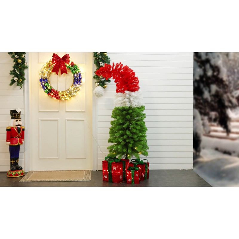 LuxenHome 5Ft Pre-Lit Artificial Tree with Santa Hat Treetop Multicolored