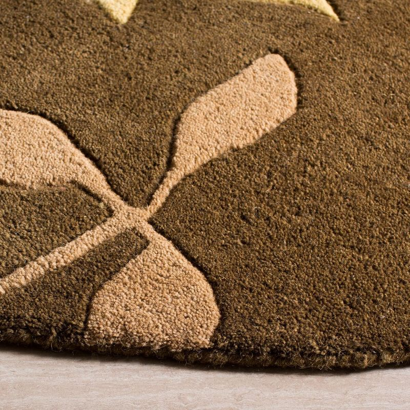 Soho SOH833 Hand Tufted Indoor Area Rug - Brown/Multi - 6' round - Safavieh.