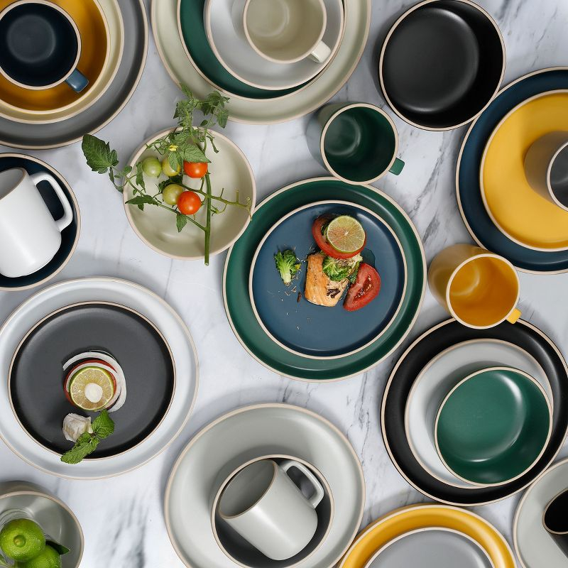 Gibson Home Zuma 16-Piece Round Matte Stoneware Dinnerware Set Black