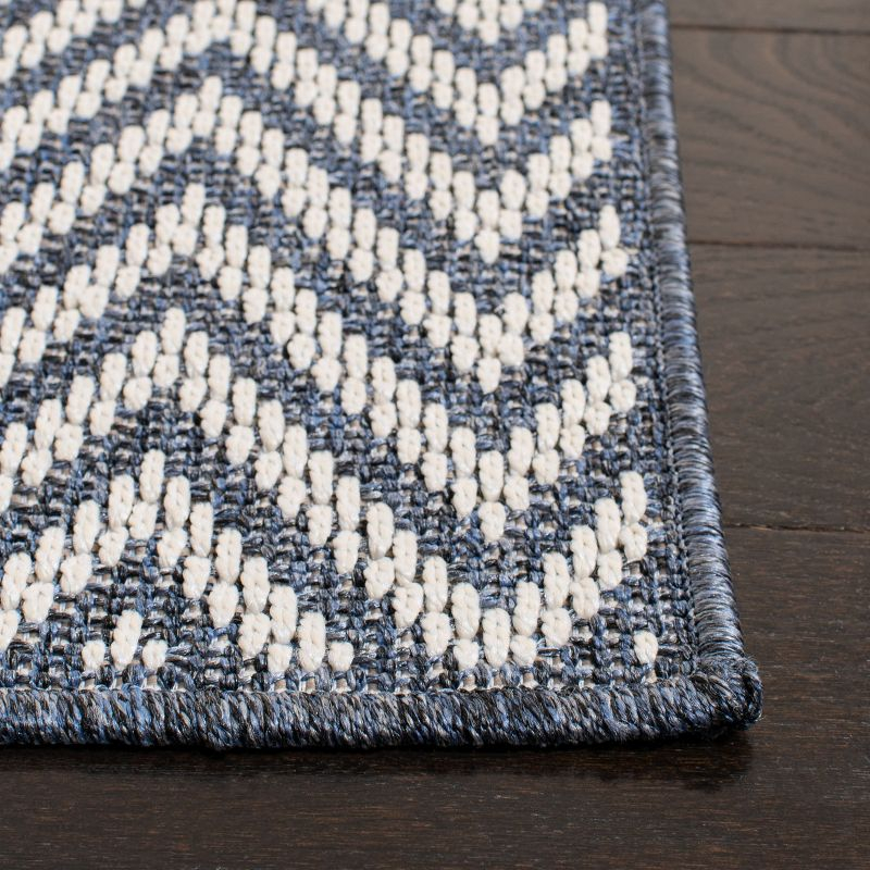 Bermuda BMU812 Power Loomed Indoor/Outdoor Area Rug - Blue/Creme - 6'7"x9'2" - Safavieh.