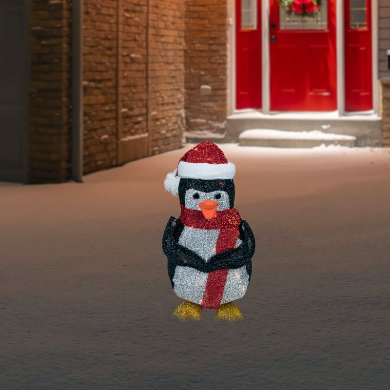 Northlight 19.5" White and Red Lighted Penguin with Santa Hat Outdoor Christmas Decoration