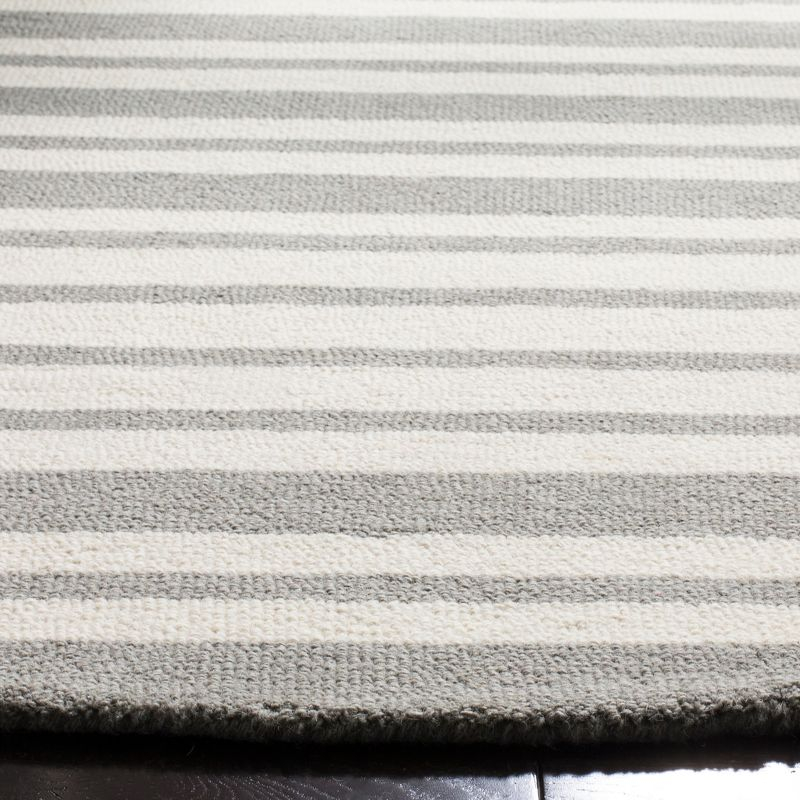 Safavieh Kids Barcode SFK917 Hand Tufted Indoor Area Rug - Grey/Multi - 5' Round - Safavieh