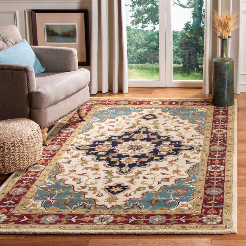 Heritage HG760 Hand Tufted Area Rug - Ivory/Red - 8'3"x11' - Safavieh.