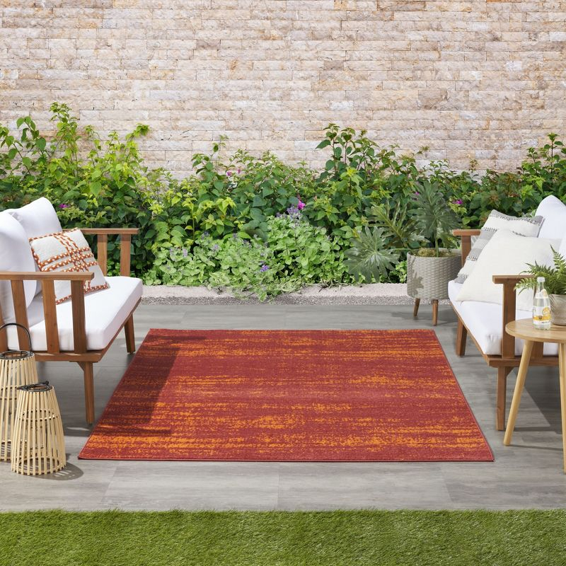 Nourison Essentials Abstract Low Pile Indoor Outdoor Area Rug 6' x 9' Red