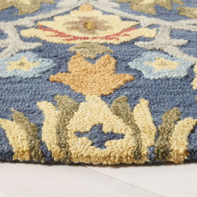 Blossom BLM402 Hand Tufted Area Rug - Navy/Multi - 4' round - Safavieh.