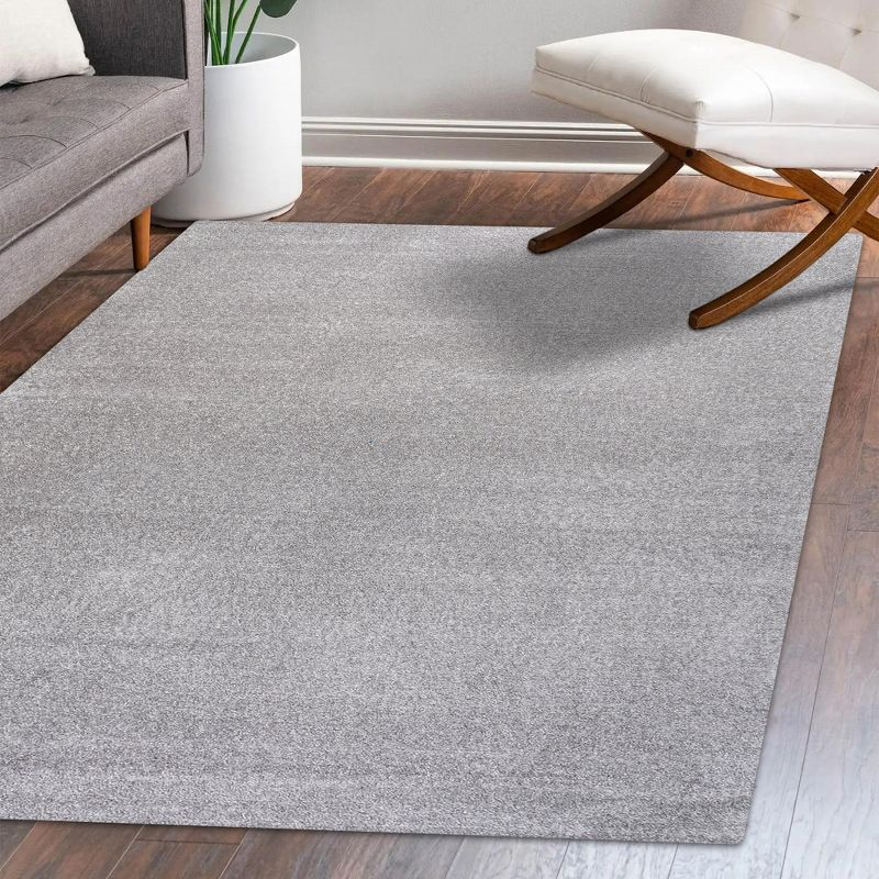 8'x10' Haze Solid Low-Pile Area Rug, Light Gray - JONATHAN Y