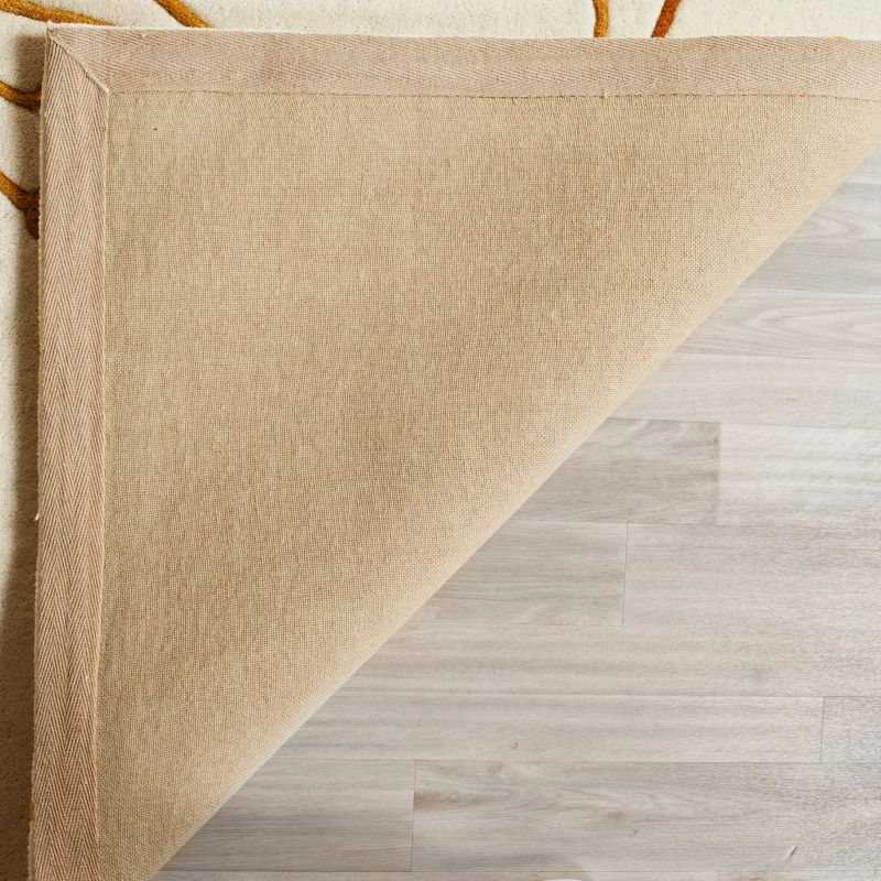 Soho SOH305 Hand Tufted Area Rug - Ivory/Orange - 6'x9' - Safavieh.