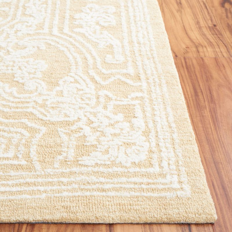 Ebony EBN310 Hand Tufted Indoor Area Rug - Ivory/Gold - 5'x8' - Safavieh