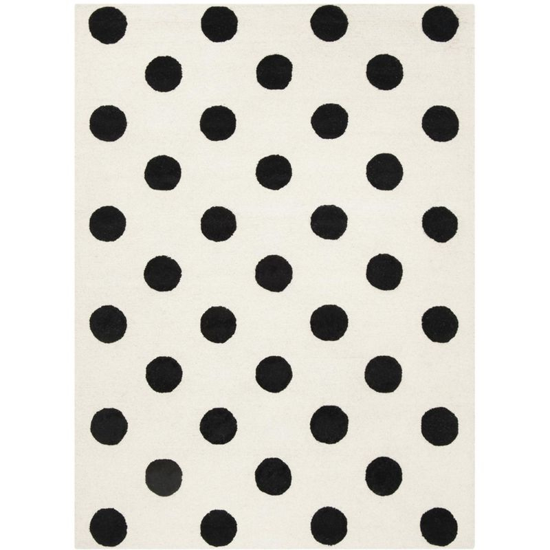 Safavieh Kids Polka Dots SFK904 Hand Tufted Indoor Area Rug - Ivory/Black - 6'x9' - Safavieh