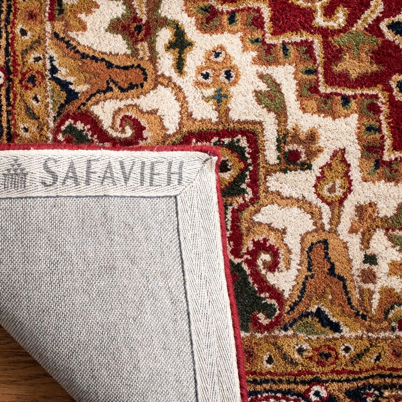 Classic CL763 Hand Tufted Area Rug - Red/Navy - 7'6"x9'6" Oval - Safavieh.