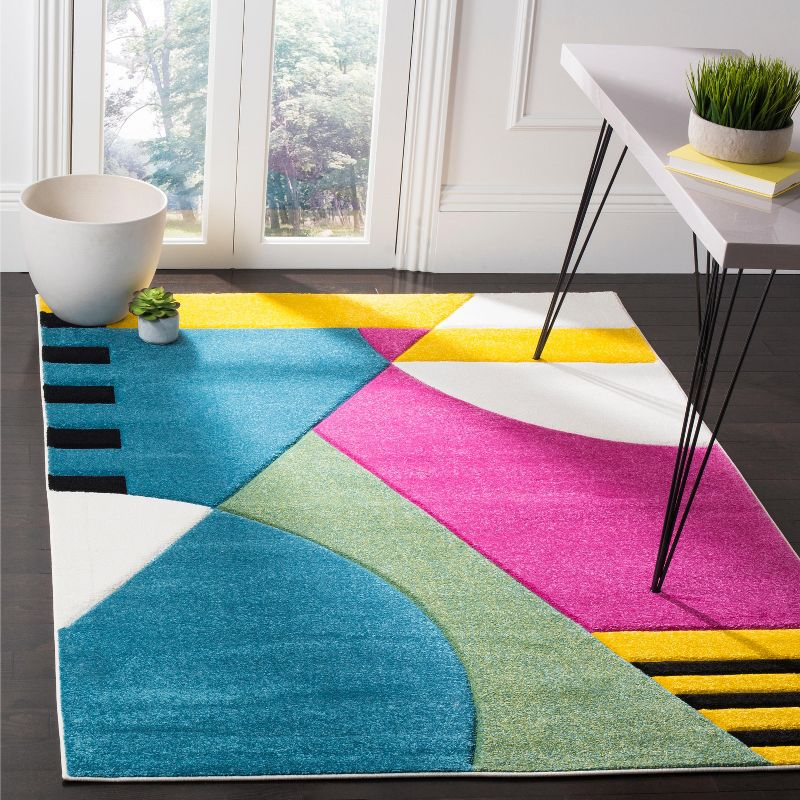 Hollywood HLW706 Power Loomed Area Rug - Peacock Blue/Fuchsia - 5'3"x7'6" - Safavieh.
