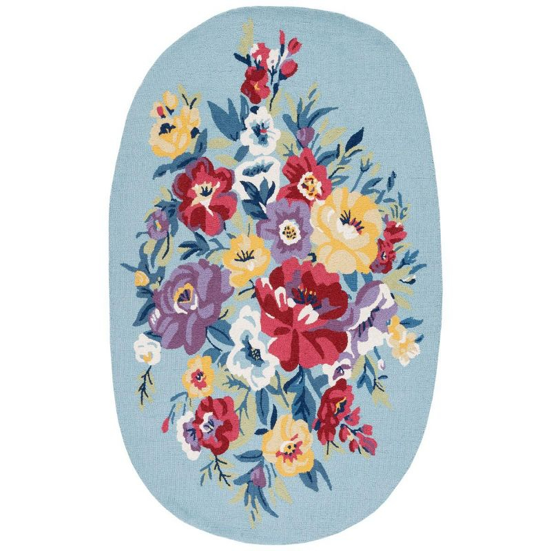 Chelsea HK219 Hand Tufted Area Rug - Blue/Rose - 6'x9' Oval - Safavieh.