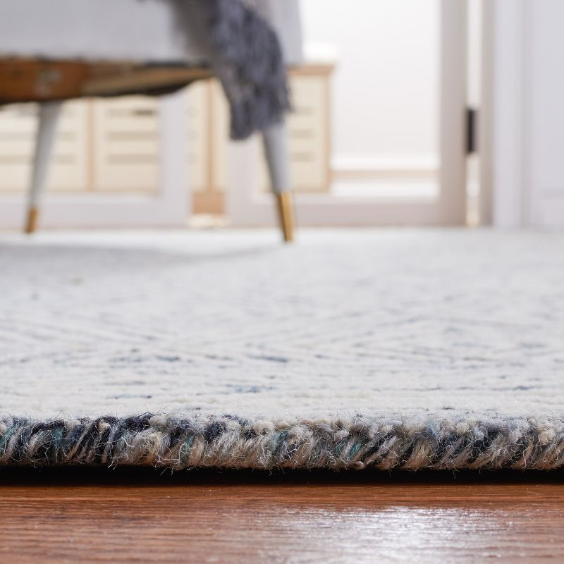 Capri CPR217 Hand Tufted Area Rug - Ivory/Blue - 8'x10' - Safavieh.