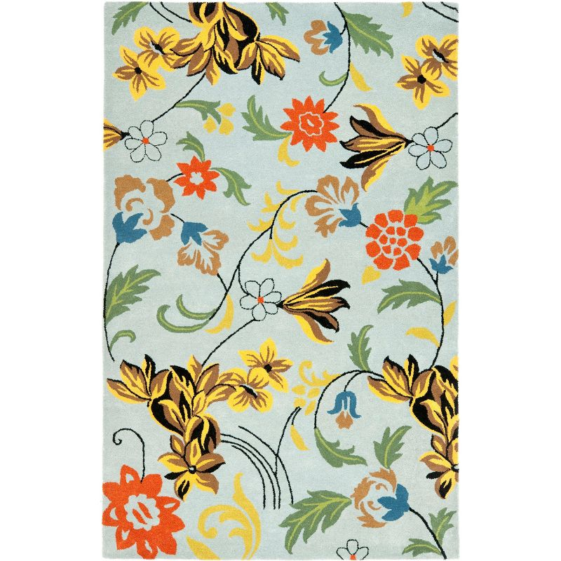 Soho SOH736 Hand Tufted Rectangle Contemporary Area Rug - Blue - 5' X 8' - Safavieh.
