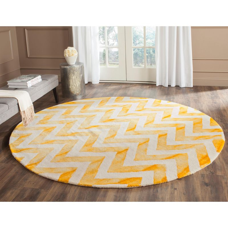 Dip Dye DDY715 Hand Tufted Area Rug - Ivory/Gold - 7' round - Safavieh.