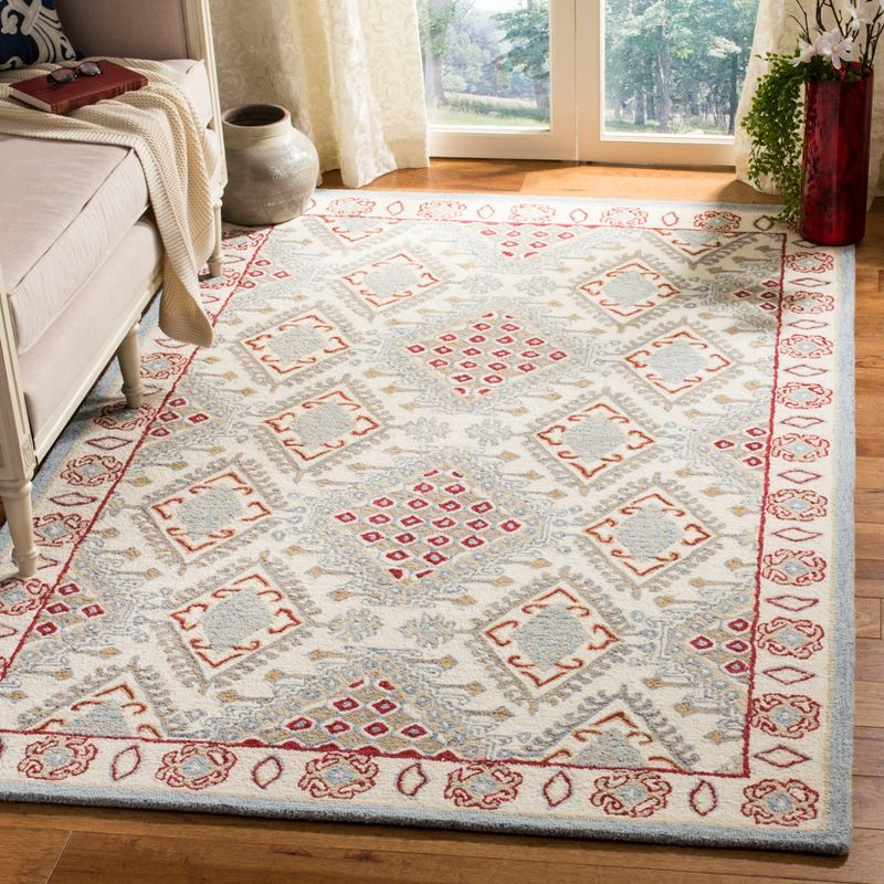 Micro-Loop MLP511 Hand Tufted Indoor Area Rug - Ivory/Red - 5'x8' - Safavieh