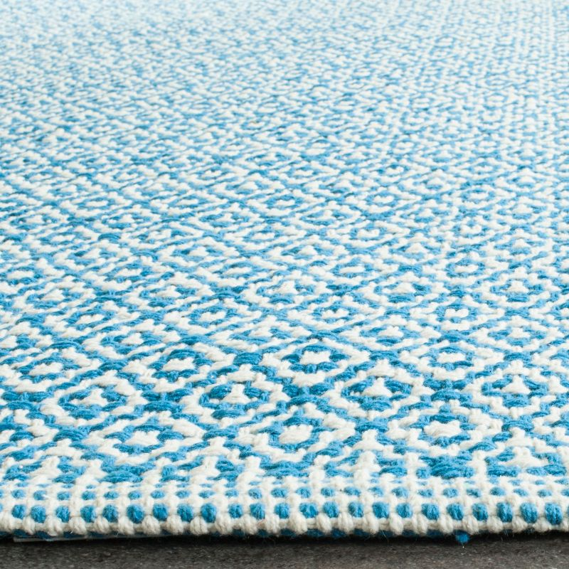 Montauk MTK717 Hand Woven Area Rug - Ivory/Blue - 5'x7' - Safavieh.