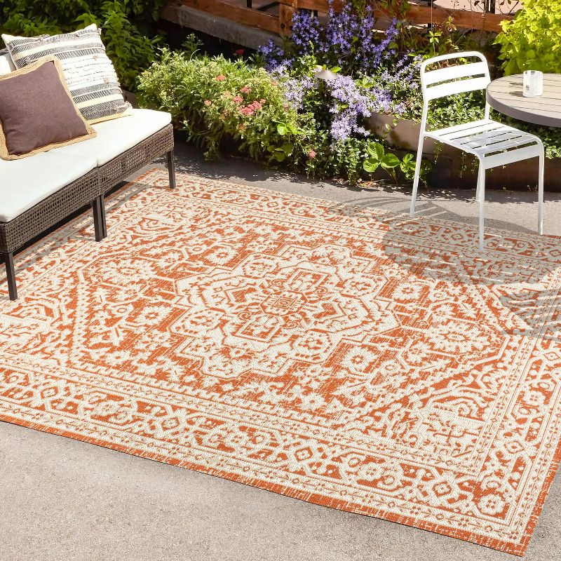 9' x 12' Sinjuri Medallion Textured Weave Indoor/Outdoor Area Rug, Orange/Cream - JONATHAN Y