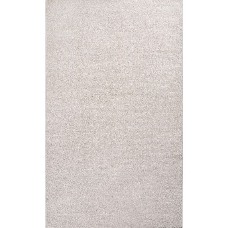 8'x10' Haze Solid Low-Pile Area Rug, Ivory - JONATHAN Y